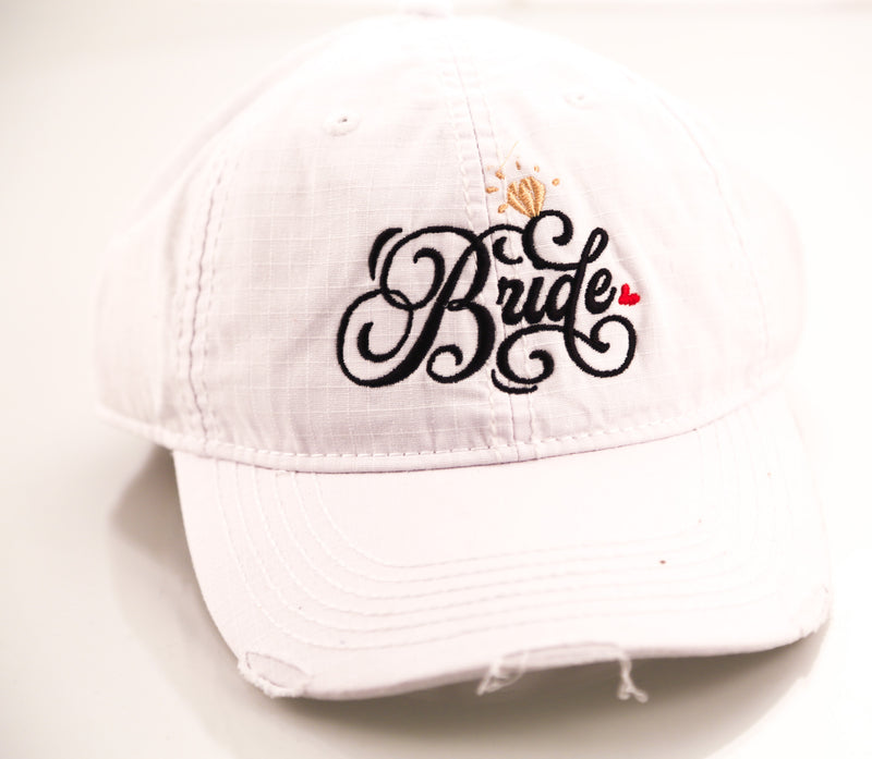 "Bride" Swirly Font with Colored Hearts White Embroidered Distressed Hat